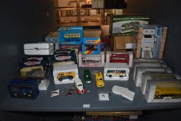 A shelf of modern diecasts oncluding EFE, Vanguards, Matchbox, Corgi (china), Solido etc, most