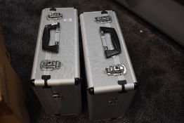 Two alloy camera cases