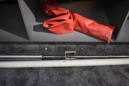 A six foot projector screen in a soft cover