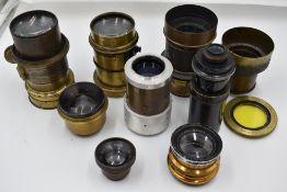 A selection of nine predominantly brass lenses including Ross, R & J Beck and de Maria, Paris