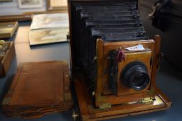 A Mahogany cased field camera by R & H Robbins, Exchange Street Liverpool with a Ross lens and
