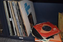 A selection of vinyl albums and singles including The Beatles interest