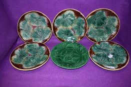 A set of five antique Majolica styled plates having naturalistic leave design in fair to good