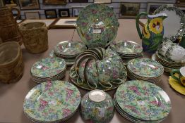 An array of Empire ware Lilac time including cups and saucers,plates, sugar basin,bowls, plates