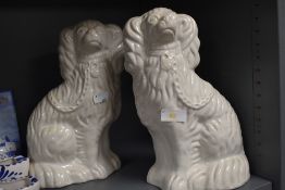 A pair of Staffordshire mantel dogs.