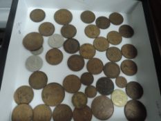 A mixed collection of vintage and antique coins, including Britain, Guernsey, Canada and similar.