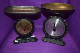 Two sets of Salter scales one antique set having brass dial face and cast base both sets are No.45