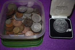 A selection of collectable coins and currency including crown and shillings