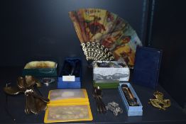 A selection of curios and trinkets including Burnley penny saver and semi precious mineral stones