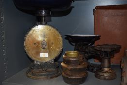 Two sets of antique kitchen weighing scales including Salters Family scale and similar