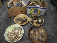Two boxes of mid century chalk ware wall plaques having three dimensional scenes,different styles