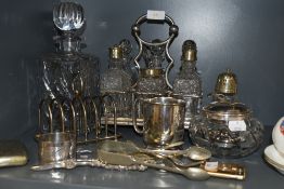 A selection of glass and plated table wares including cruet set and pickle jar