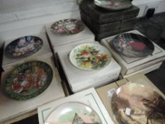 A large lot of collectable display plates with boxes.
