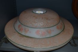 An Art Deco pressed glass light shade with fitments having pink and frosted design