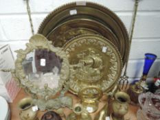 A selection of brass wares including several nautical galleon themed wall plaques and mirror