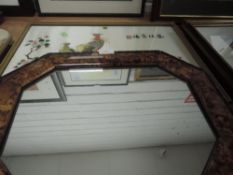 A vintage oriental embroidery depicting birds and flowers,and a vintage wall mirror.