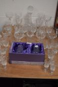 A selection of clear cut and crystal glass ware including brandy wine and whisky glasses