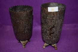 A pair of Indian tall stem chase work vase having cast three footed bases