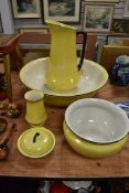 A Myott and sons full wash set including chamber pot, jug and bowl and more, having yellow ground to
