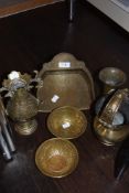 A selection of Indian or Asian style brass wares including two hand worked offering bowls and