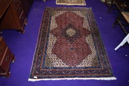 A Persian sorouk rug, 100% wool pile, approx. 160 x 103cm