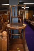 A traditional stained frame bentwood chair, previously wormed seat
