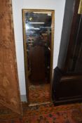 A gilt frame full length mirror, approx. 127 x 35cm, minimal damage to frame