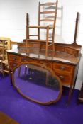 An Edwardian mahogany and inlaid dressing table , labelled for Maple and Co