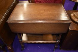 A mid to late 20th Century priory style tea trolley