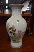 A reproduction Oriental vase, nice decorators piece, height approx 36cm some cracking to the neck