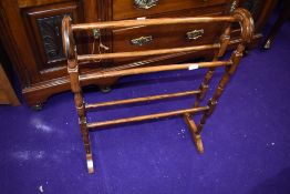 A traditional stained frame towel rail, width approx. 63cm