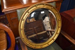 A gilt frame circular mirror, diameter approx. 55cm