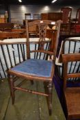 An edwardian mahogany and inlaid bedroom chair of small proportions, probably a childs, having