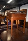 A 19th Century mahogany slope front teachers or preachers desk, dimensions approx. W60 D53 H95cm