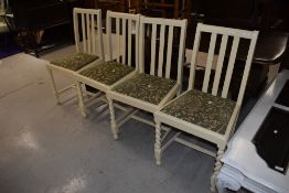 A set of four traditional dining chairs, having later painted twist frames