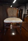 A Victorian mahogany dining chair having stuffed seat and bergere back (needs attention)