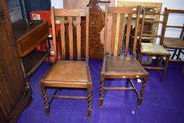 A pair of mid 20th Century oak dining chairs