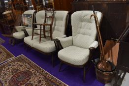A vintage Dark stained Ercol style cottage suite