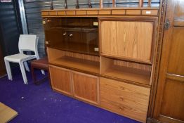 A vintage teak effect laminate wall unit, dimensions approx. W150cm H130cm