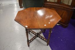 A late Victorian mahogany octagonal table having turned and bobbin frame, approx. diameter 83cm