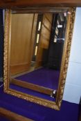 A gilt framed wall mirror, approx 67 x 97cm