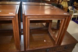 A vintage teak G plan nest of three tables