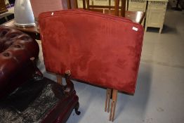 A pair of modern suedette single headboards