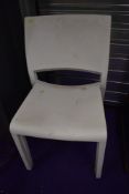 Twelve modern moulded plastic chairs, bit grubby but sound