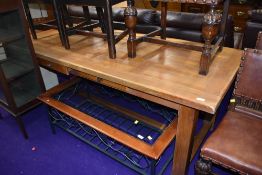 A good quality light stain refectory kitchen dining table with frieze drawers