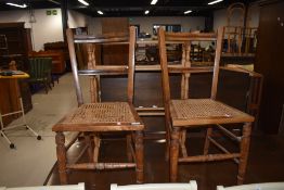 A pair of Victorian stained frame cane seated bedroom chairs