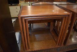 A vintage teak G plan nest of three tables