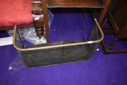 A vintage low fireguard, width approx. 68cm