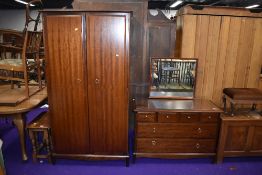 A stag wardrobe and dressing table