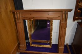 A traditional fire surround and similar fender, width approx 132 cm